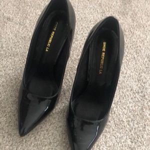 Never worn black patent leather heel